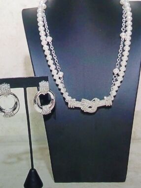 Elegant White Pearl and Silver Knot Necklace with Matching Hoop Earrings